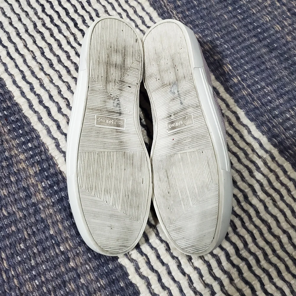 Call it spring purple flat slip on Sneakers shoes.